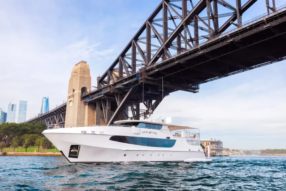 EVOLUTION passing beneath the Sydney Harbour Bridge