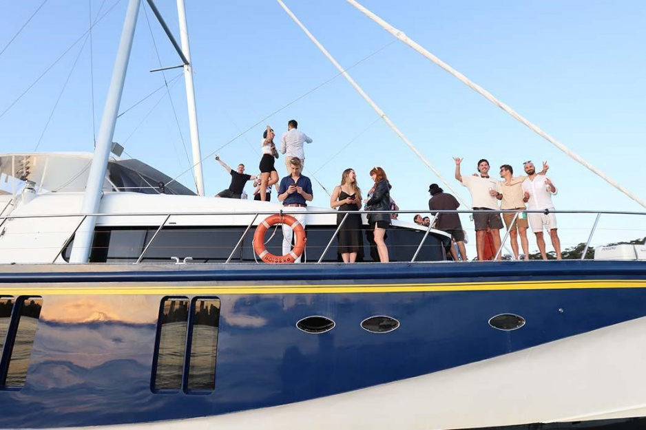 Friends Waving From Chapman Boat For 21st Boat Hire Sydney