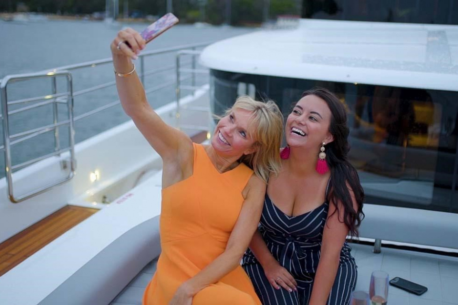 Taking A Photo On Champan Yacht With A Corporate Functions Yacht Hire